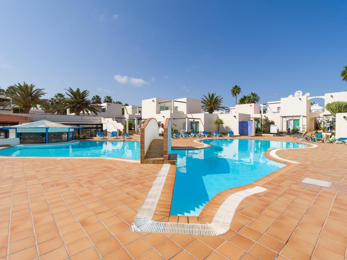 Homeforguest Moderno Apartamento Con Piscina En Коральео Экстерьер фото